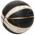 Ballon de basket avec design noir, blanc et doré